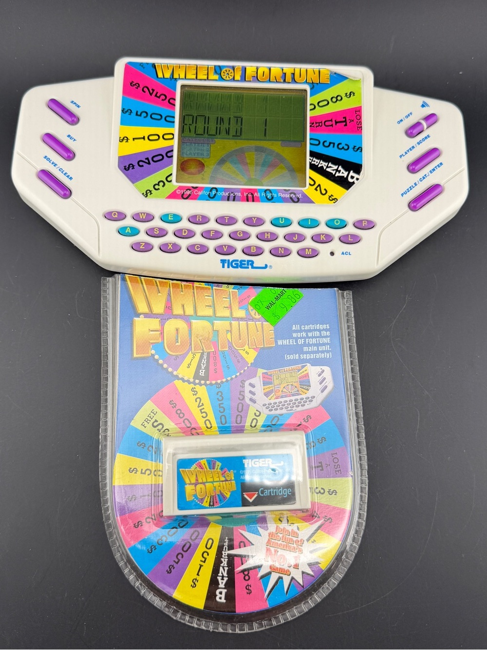 TIGER Electronic Wheel Of Fortune Handheld Game with 2 Cartridges Works